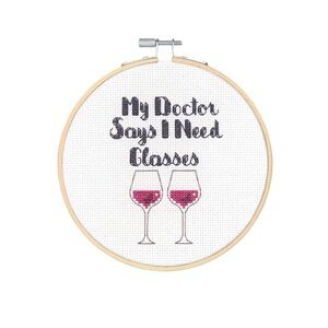 Humorous Cross-Stitch Art with Wine Glasses